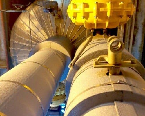 dragon jacket insulation installed at an agricultural processing plant, focus on custom valve