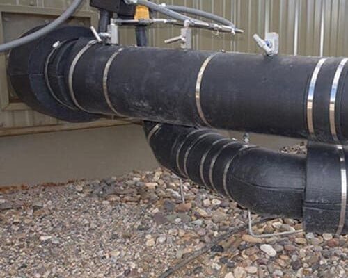 dragon jacket insulation installed in north Dakota oilfield, focus on section with 90° elbows